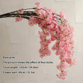 Wedding arch decoration with artificial silk cherry blossom branches