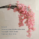 Wedding arch decoration with artificial silk cherry blossom branches