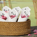 Personalized wedding confetti cones with names and date,