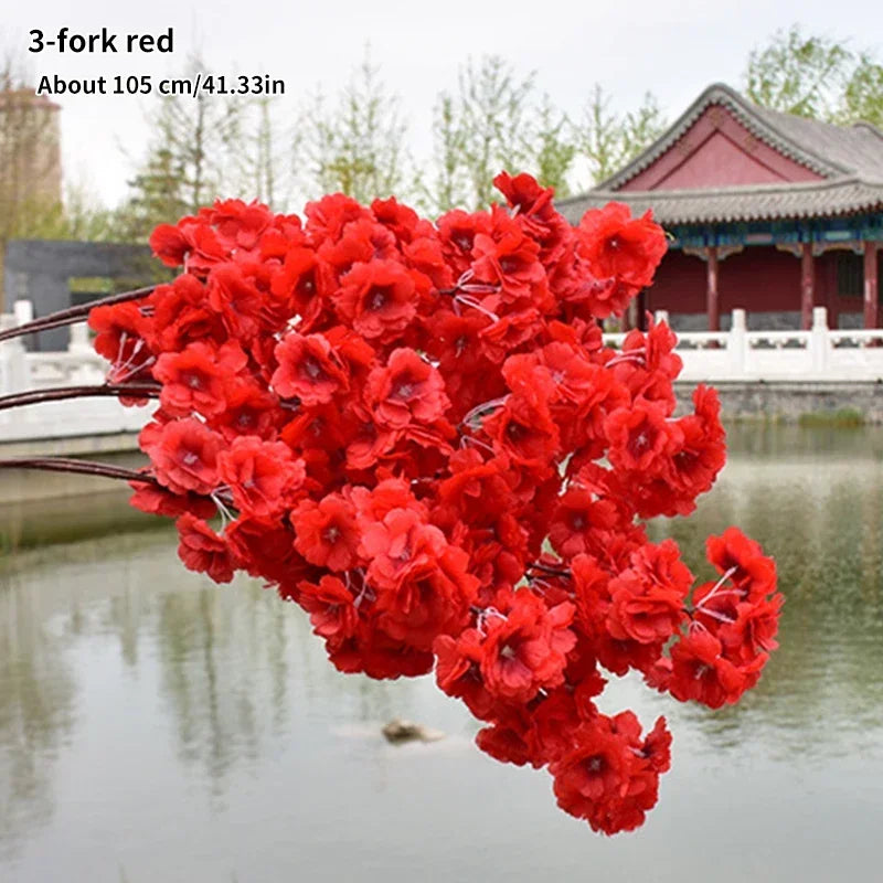 Wedding arch decoration with artificial silk cherry blossom branches