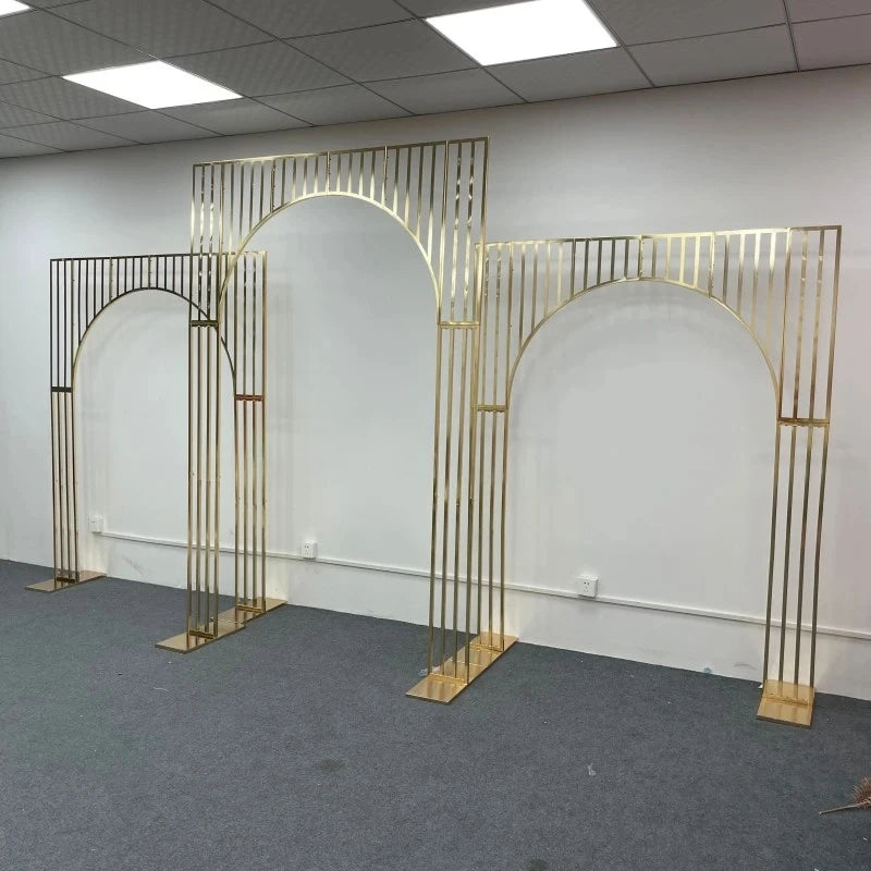 Wedding background decoration with wrought iron frame, shiny arches, golden shelf,