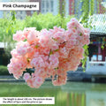 Wedding arch decoration with artificial silk cherry blossom branches