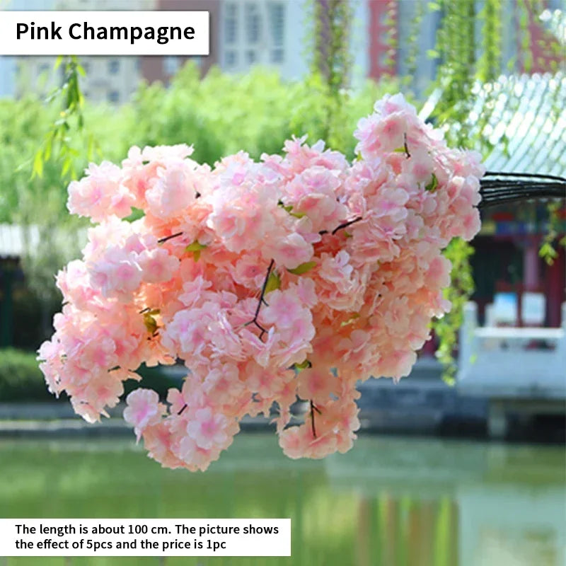 Wedding arch decoration with artificial silk cherry blossom branches