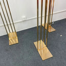 Wedding background decoration with wrought iron frame, shiny arches, golden shelf,