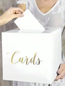 White card box set for voting game with foil design.
