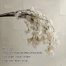 Wedding arch decoration with artificial silk cherry blossom branches