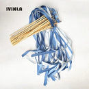 Wedding wand set with fuchsia and pink ribbon and gold bells