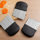 Stainless steel French fry cutter.