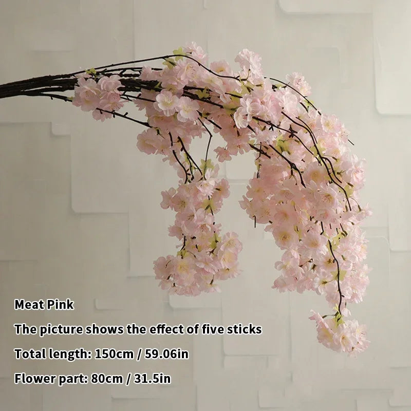 Wedding arch decoration with artificial silk cherry blossom branches