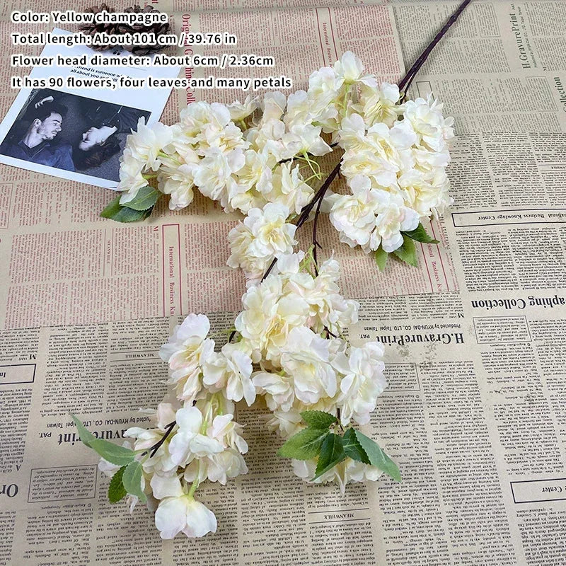 Wedding arch decoration with artificial silk cherry blossom branches