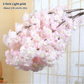 Wedding arch decoration with artificial silk cherry blossom branches