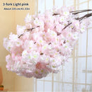 Wedding arch decoration with artificial silk cherry blossom branches