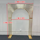 Wedding background decoration with wrought iron frame, shiny arches, golden shelf,